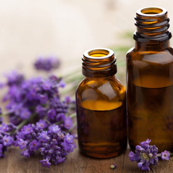 essential oil and lavender flowers