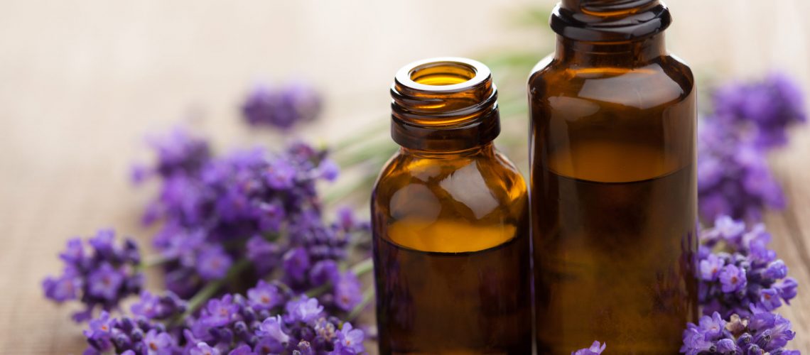 essential oil and lavender flowers